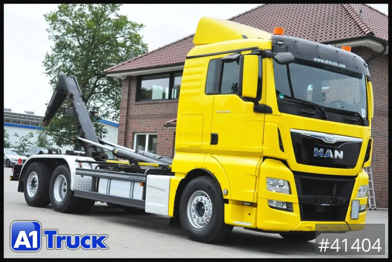 MAN - Abrollkipper - LKW > 7.5 - TGX 26,500, Meiller, Knickarm, Lenkachse, Funk 